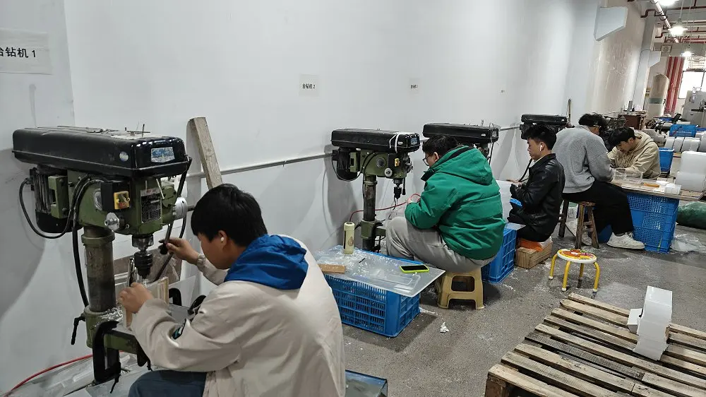 Operators drilling acrylic components