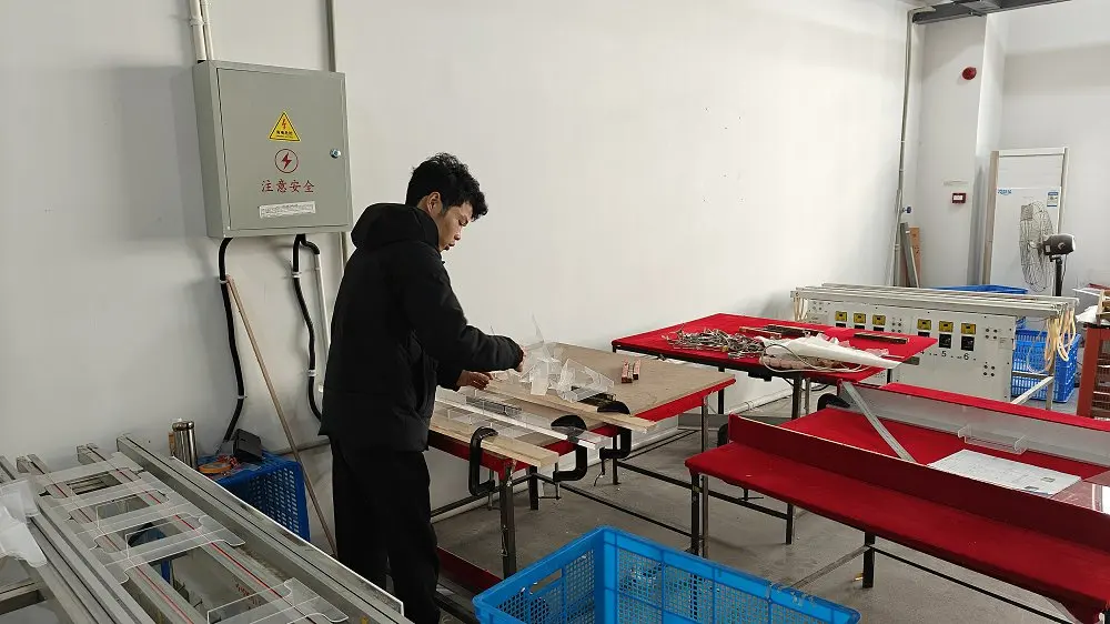 Operator carrying out acrylic hot bending
