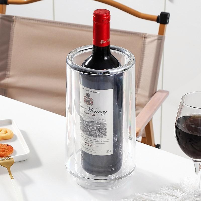 Clear double-wall wine chiller holding a red wine bottle