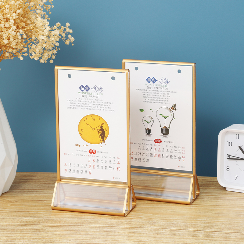Clear acrylic sign holders with gold-coloured edging